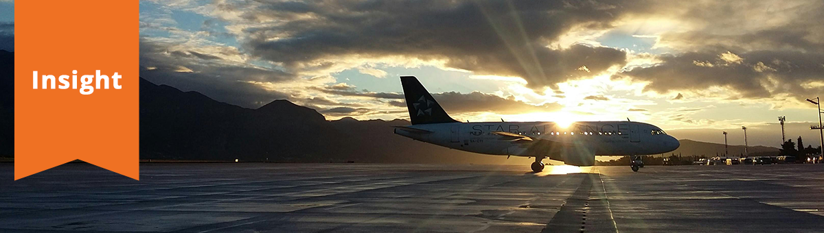 an airplane waiting at the airport for passengers to board